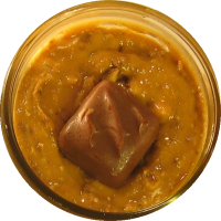 An image of homemade peanut butter with Snickers mixed in.